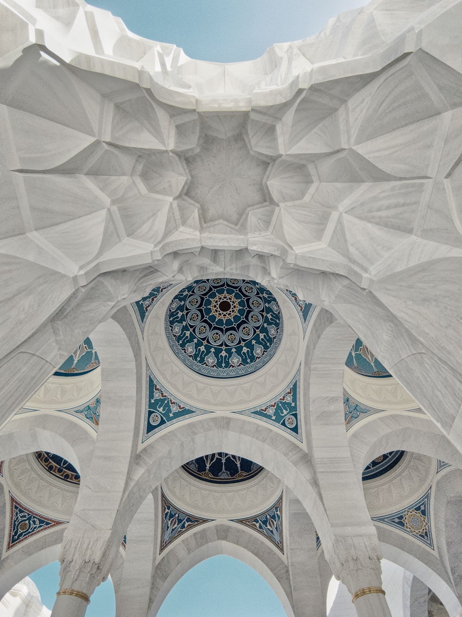 White carved muqarnas vaulting rising toward a mosaic dome.